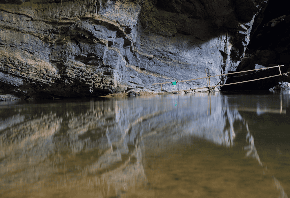 Guests are given the unique experience of gliding through shadowy waters formed over millennia (Source: Canva)